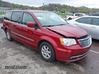 2012 Chrysler Town & Country Touring with VIN 2C4RC1BG8CR344068, listed as a IAAI auction lot 41970494 with 130,559 mi miles. Bid and sale history available at carsss.com. Image 1.