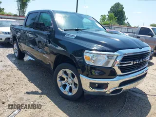 2021 Ram 1500 Big Horn with VIN 1C6SRFFT6MN565064, listed as a IAAI auction lot 42142024 with 102,942 mi miles and . Bid and sale history available at DreamBid. Image 1.