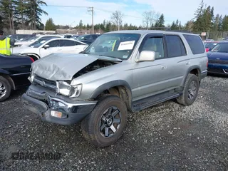 1999 Toyota 4Runner SR5 z VIN JT3HN86R0X0196528, wystawiony jako IAAI lot #41666499 z przebiegiem 294 216 mil mil oraz . Historia ofert i sprzedaży dostępna na DreamBid. Obrazek 18.