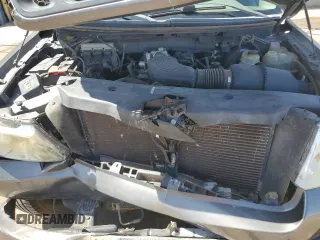 2006 Ford F-150 STX with VIN 1FTRX02W06KB84129, listed as a Copart auction lot 60349115 with 132,768 mi miles and Salvage title. Bid and sale history available at DreamBid. Image 11.