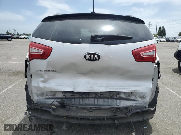 2013 Kia Sportage LX z VIN KNDPB3A26D7357884, wystawiony jako Copart lot #55836165 z przebiegiem 140 252 mil mil oraz Szkoda całkowita • Salvage title. Historia ofert i sprzedaży dostępna na DreamBid. Obrazek 6.