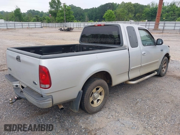 2000 Ford F-150 XL with VIN 1FTZX1725YNC17400, listed as a IAAI auction lot 42031955 with 1 mi miles. Bid and sale history available at carsss.com. Image 4.
