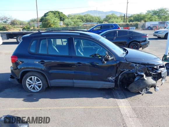 2015 Volkswagen Tiguan S z VIN WVGAV7AX8FW615777, wystawiony jako IAAI lot #42165193 z przebiegiem Nie podano mil oraz . Historia ofert i sprzedaży dostępna na DreamBid. Obrazek 13.
