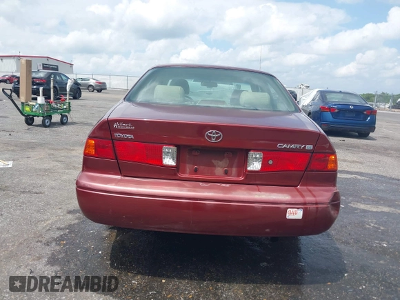 2000 Toyota Camry CE z VIN JT2BG22K3Y0521541, wystawiony jako IAAI lot #42074772 z przebiegiem 144 587 mil mil oraz . Historia ofert i sprzedaży dostępna na DreamBid. Obrazek 16.