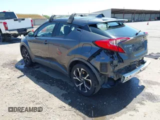 2018 Toyota C-HR XLE with VIN NMTKHMBXXJR047391, listed as a IAAI auction lot 42180973 with 140,674 mi miles and . Bid and sale history available at DreamBid. Image 3.
