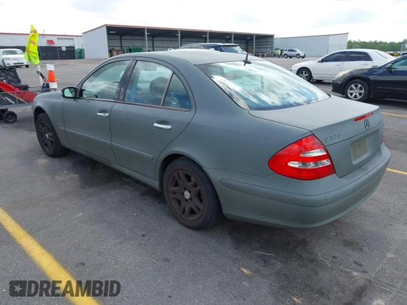 2003 Mercedes-Benz E-Class 3.2L with VIN WDBUF65J83A124342, listed as a IAAI auction lot 41951596 with 185,094 mi miles. Bid and sale history available at carsss.com. Image 3.