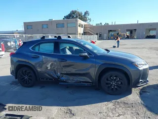 2022 Lexus UX with VIN JTHX3JBH6N2056436, listed as a IAAI auction lot 41856541 with 12,815 mi miles. Bid and sale history available at carsss.com. Image 13.