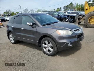 2009 Acura RDX z VIN 5J8TB18289A004485, wystawiony jako Copart lot #56356035 z przebiegiem 228 783 mil mil oraz Szkoda całkowita • Salvage title. Historia ofert i sprzedaży dostępna na DreamBid. Obrazek 4.