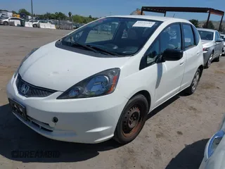 2009 Honda Fit z VIN JHMGE88239S045275, wystawiony jako IAAI lot #42142589 z przebiegiem 145 964 mil mil oraz . Historia ofert i sprzedaży dostępna na DreamBid. Obrazek 17.