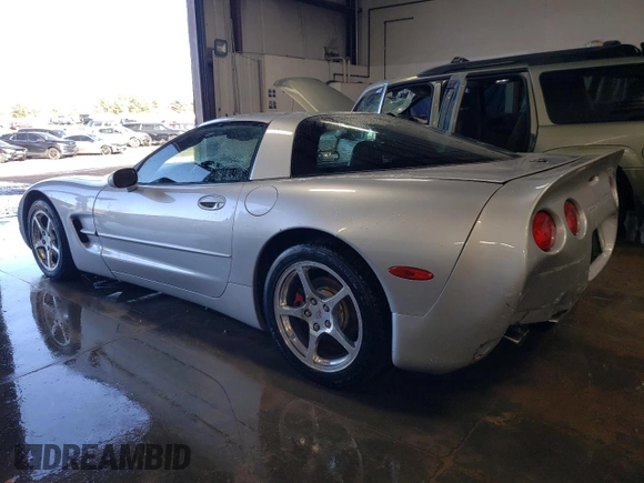 2002 Chevrolet Corvette with VIN 1G1YY22G825115140, listed as a Copart auction lot 79898774 with 64,214 mi miles and Salvage Title. Bid and sale history available at carsss.com. Image 2.
