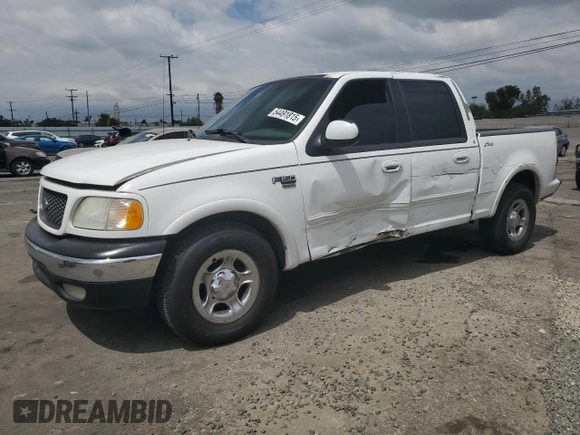 2002 Ford F-150 XLT with VIN 1FTRW07L52KA04929, listed as a Copart auction lot 54491815 with 169,132 mi miles and Salvage Title. Bid and sale history available at carsss.com. Image 1.