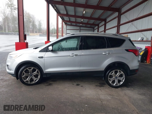 2019 Ford Escape Titanium with VIN 1FMCU9J9XKUA37695, listed as a IAAI auction lot 41868388 with 50,095 mi miles. Bid and sale history available at carsss.com. Image 14.
