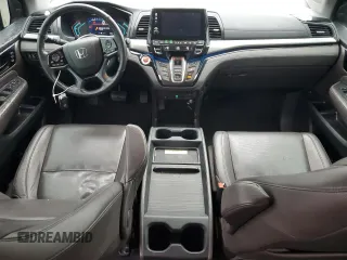 2018 Honda Odyssey Elite z VIN 5FNRL6H94JB107589, wystawiony jako Copart lot #58347385 z przebiegiem 98 761 mil mil oraz Szkody całkowita. Historia ofert i sprzedaży dostępna na DreamBid. Obrazek 8.
