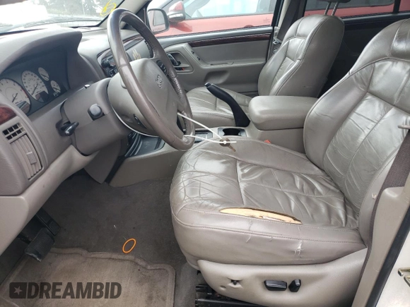 2004 Jeep Grand Cherokee Limited с VIN 1J4GW58N14C208543, выставлен на аукционе Copart как лот 64624035 с пробегом 144 362 миль миль и Списание • Salvage title. История ставок и продаж доступна на DreamBid. Изображение 7.