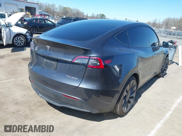 2024 Tesla Model Y Performance with VIN 7SAYGDEF1RA329825, listed as a IAAI auction lot 41762602 with 3,923 mi miles and . Bid and sale history available at DreamBid. Image 4.