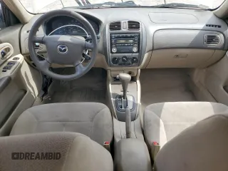 2001 Mazda Protege LX with VIN JM1BJ225810473897, listed as a Copart auction lot 52192045 with 145,839 mi miles and Salvage Title. Bid and sale history available at carsss.com. Image 8.
