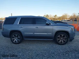 2018 Cadillac Escalade Luxury with VIN 1GYS3BKJ1JR307525, listed as a IAAI auction lot 41800377 with 171,484 mi miles. Bid and sale history available at carsss.com. Image 13.
