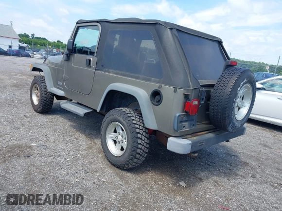 2004 Jeep Wrangler Sport with VIN 1J4FA49SX4P774167, listed as a IAAI auction lot 42686834 with 170,731 mi miles and . Bid and sale history available at DreamBid. Image 3.