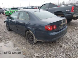 2010 Volkswagen Jetta Sedan S with VIN 3VWJZ7AJ2AM002046, listed as a IAAI auction lot 41655251 with 166,214 mi miles. Bid and sale history available at carsss.com. Image 3.