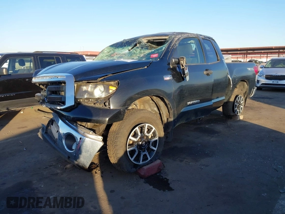 2012 Toyota Tundra z VIN 5TFUY5F13CX259746, wystawiony jako IAAI lot #41290747 z przebiegiem 190 583 mil mil oraz . Historia ofert i sprzedaży dostępna na DreamBid. Obrazek 2.