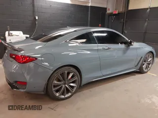 2022 Infiniti Q60 Red Sport 400 with VIN JN1FV7LL4NM681132, listed as a IAAI auction lot 40733343 with 14,309 mi miles and . Bid and sale history available at DreamBid. Image 4.
