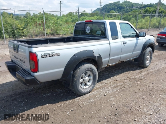 2001 Nissan Frontier SE Desert Runner z VIN 1N6ED26T61C303868, wystawiony jako IAAI lot #42698412 z przebiegiem 223 551 mil mil oraz . Historia ofert i sprzedaży dostępna na DreamBid. Obrazek 4.