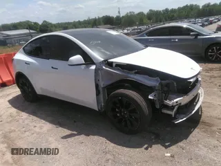 2022 Tesla Model Y Long Range z VIN 7SAYGDEE3NF385933, wystawiony jako IAAI lot #42059675 z przebiegiem 88 488 mil mil oraz . Historia ofert i sprzedaży dostępna na DreamBid. Obrazek 1.