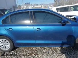 2017 Volkswagen Jetta 1.4T S with VIN 3VW2B7AJ5HM317846, listed as a IAAI auction lot 41755207 with 128,318 mi miles. Bid and sale history available at carsss.com. Image 13.