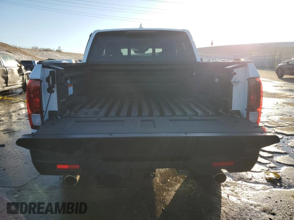 2021 Honda Ridgeline RTL-E with VIN 5FPYK3F74MB019684, listed as a Copart auction lot 42140235 with 31,223 mi miles and Salvage title. Bid and sale history available at DreamBid. Image 6.
