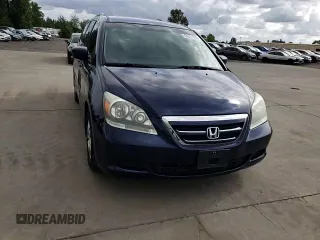 2006 Honda Odyssey EX with VIN 5FNRL38436B089189, listed as a Copart auction lot 57311505 with 165,325 mi miles and Salvage title. Bid and sale history available at DreamBid. Image 13.