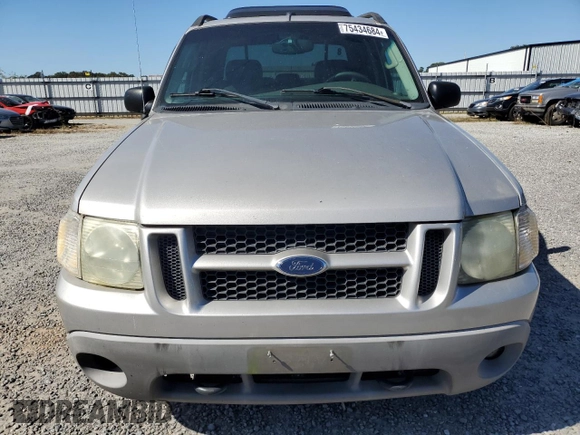 2004 Ford Explorer Sport Trac XLS z VIN 1FMDU77K24UA03885, wystawiony jako Copart lot #75434684 z przebiegiem Nie podano mil oraz Szkoda całkowita • Salvage title. Historia ofert i sprzedaży dostępna na DreamBid. Obrazek 5.