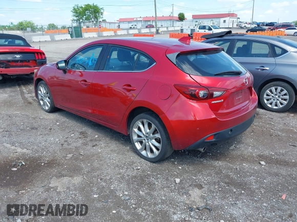 2014 Mazda 3 S Touring with VIN JM1BM1L36E1139818, listed as a IAAI auction lot 42129839 with 134,397 mi miles and . Bid and sale history available at DreamBid. Image 3.