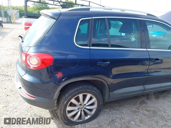 2011 Volkswagen Tiguan SE with VIN WVGAV7AX7BW530357, listed as a IAAI auction lot 42740821 with 170,636 mi miles and . Bid and sale history available at DreamBid. Image 6.