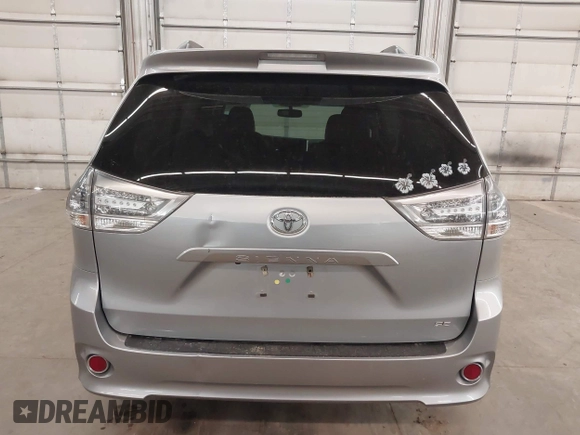 2015 Toyota Sienna SE with VIN 5TDXK3DC9FS527667, listed as a IAAI auction lot 41977729 with 230,933 mi miles and . Bid and sale history available at DreamBid. Image 17.
