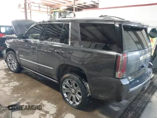 2016 GMC Yukon Denali with VIN 1GKS2CKJ8GR215954, listed as a IAAI auction lot 41362739 with 143,982 mi miles. Bid and sale history available at carsss.com. Image 3.