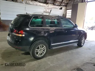 2010 Volkswagen Touareg VR6 with VIN WVGBF7A99AD002591, listed as a Copart auction lot 70624234 with 154,330 mi miles and Salvage Title. Bid and sale history available at DreamBid. Image 3.