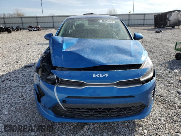 2023 Kia Rio S z VIN 3KPA24AD2PE529734, wystawiony jako Copart lot #48755585 z przebiegiem 99 031 mil mil oraz Szkody całkowita. Historia ofert i sprzedaży dostępna na DreamBid. Obrazek 5.