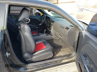 2013 Dodge Challenger SXT z VIN 2C3CDYAG0DH511323, wystawiony jako IAAI lot #41369796 z przebiegiem Nie podano mil oraz . Historia ofert i sprzedaży dostępna na DreamBid. Obrazek 5.