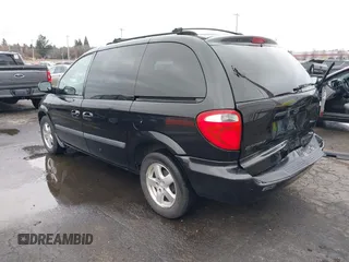 2007 Dodge Caravan SXT with VIN 1D4GP45R87B161237, listed as a IAAI auction lot 41594127 with 154,508 mi miles and . Bid and sale history available at DreamBid. Image 3.
