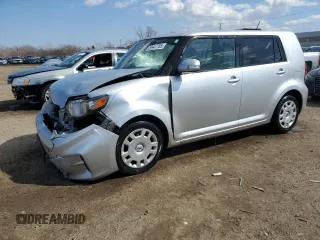 2012 Scion xB with VIN JTLZE4FE1CJ009084, listed as a Copart auction lot 50447785 with 74,155 mi miles and Salvage Title. Bid and sale history available at carsss.com. Image 1.