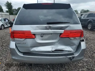 2010 Honda Odyssey LX with VIN 5FNRL3H2XAB059078, listed as a Copart auction lot 61144895 with 116,724 mi miles and Salvage title. Bid and sale history available at DreamBid. Image 6.