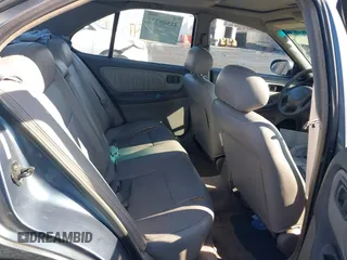 1999 Nissan Altima XE with VIN 1N4DL01D3XC273197, listed as a IAAI auction lot 41508232 with 168,658 mi miles. Bid and sale history available at carsss.com. Image 8.
