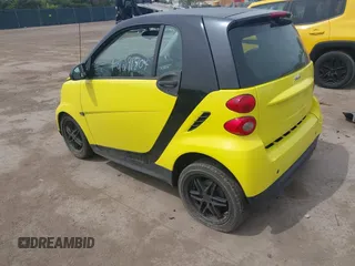 2013 Smart fortwo Pure with VIN WMEEJ3BA5DK663165, listed as a IAAI auction lot 42291804 with 105,074 mi miles and . Bid and sale history available at DreamBid. Image 3.