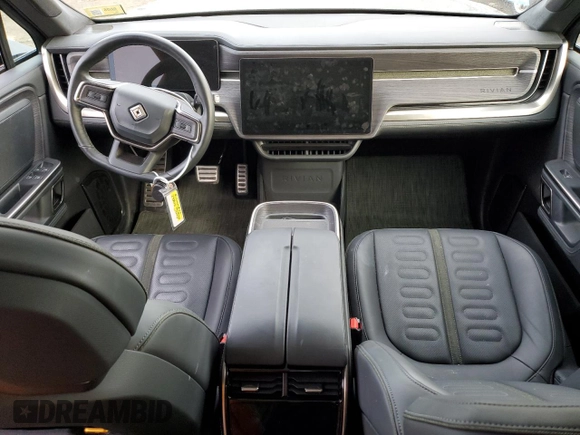 2023 Rivian R1T Adventure z VIN 7FCTGBAA8PN028065, wystawiony jako Copart lot #81941474 z przebiegiem 16 060 mil mil oraz Szkoda całkowita • Salvage title. Historia ofert i sprzedaży dostępna na DreamBid. Obrazek 8.