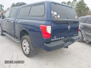 2019 Nissan Titan XD SV with VIN 1N6BA1F49KN506712, listed as a IAAI auction lot 41661789 with 107,972 mi miles. Bid and sale history available at carsss.com. Image 3.