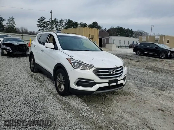 2018 Hyundai Santa Fe 2.4L z VIN 5NMZT3LB5JH092883, wystawiony jako Copart lot #48522495 z przebiegiem 69 745 mil mil oraz Szkoda całkowita • Salvage title. Historia ofert i sprzedaży dostępna na DreamBid. Obrazek 14.
