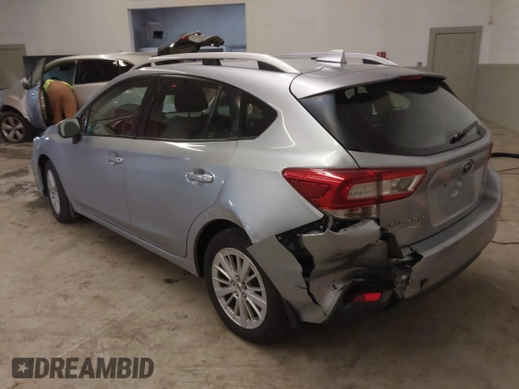 2017 Subaru Impreza Premium z VIN 4S3GTAB63H3705818, wystawiony jako IAAI lot #41568064 z przebiegiem 132 046 mil mil oraz . Historia ofert i sprzedaży dostępna na DreamBid. Obrazek 3.