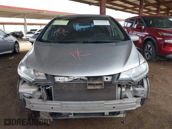 2015 Honda Fit LX with VIN 3HGGK5G52FM764205, listed as a IAAI auction lot 42641420 with 104,783 mi miles and . Bid and sale history available at DreamBid. Image 13.