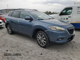 2015 Mazda CX-9 Grand Touring z VIN JM3TB2DAXF0448042, wystawiony jako Copart lot #53620085 z przebiegiem 134 386 mil mil oraz Szkoda całkowita • Salvage title. Historia ofert i sprzedaży dostępna na DreamBid. Obrazek 4.