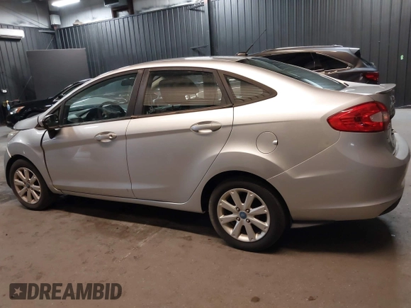 2012 Ford Fiesta SE with VIN 3FADP4BJ1CM110315, listed as a IAAI auction lot 39266357 with 144,749 mi miles. Bid and sale history available at carsss.com. Image 14.